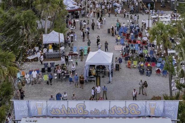 Aerial photo of stage with crowd gathered 
