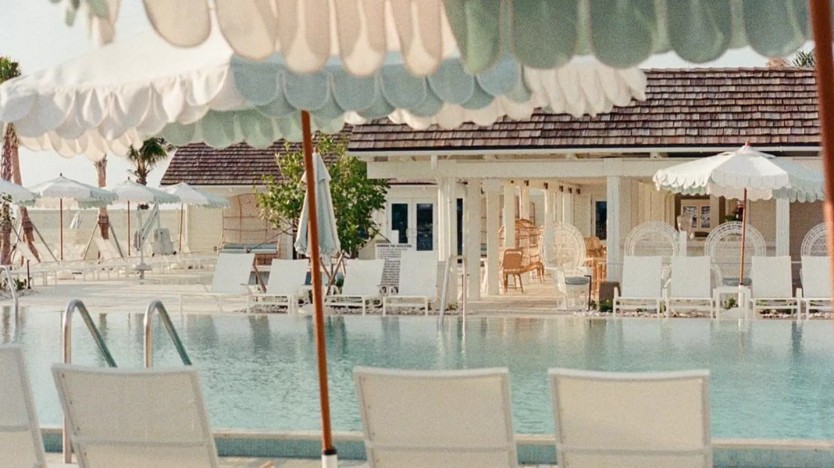 Gasparilla Inn boca grande pool with umbrellas