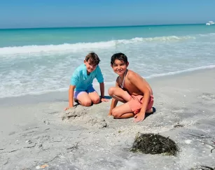 Waves roll onto a sandy beach on Boca Grande Outer Islands.